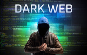 Faceless hacker with DARK WEB inscription on a binary code background